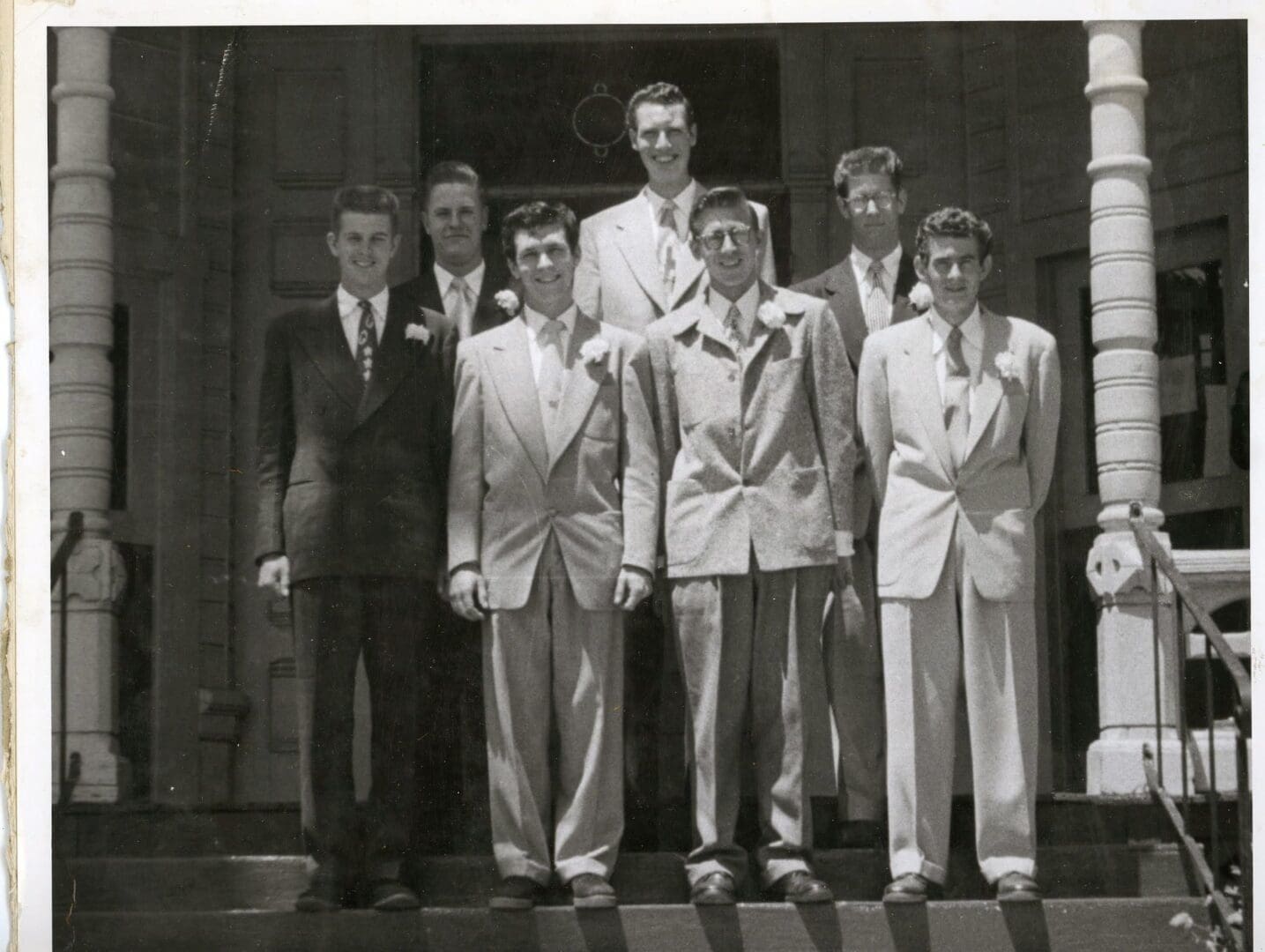 A group of men standing next to each other.