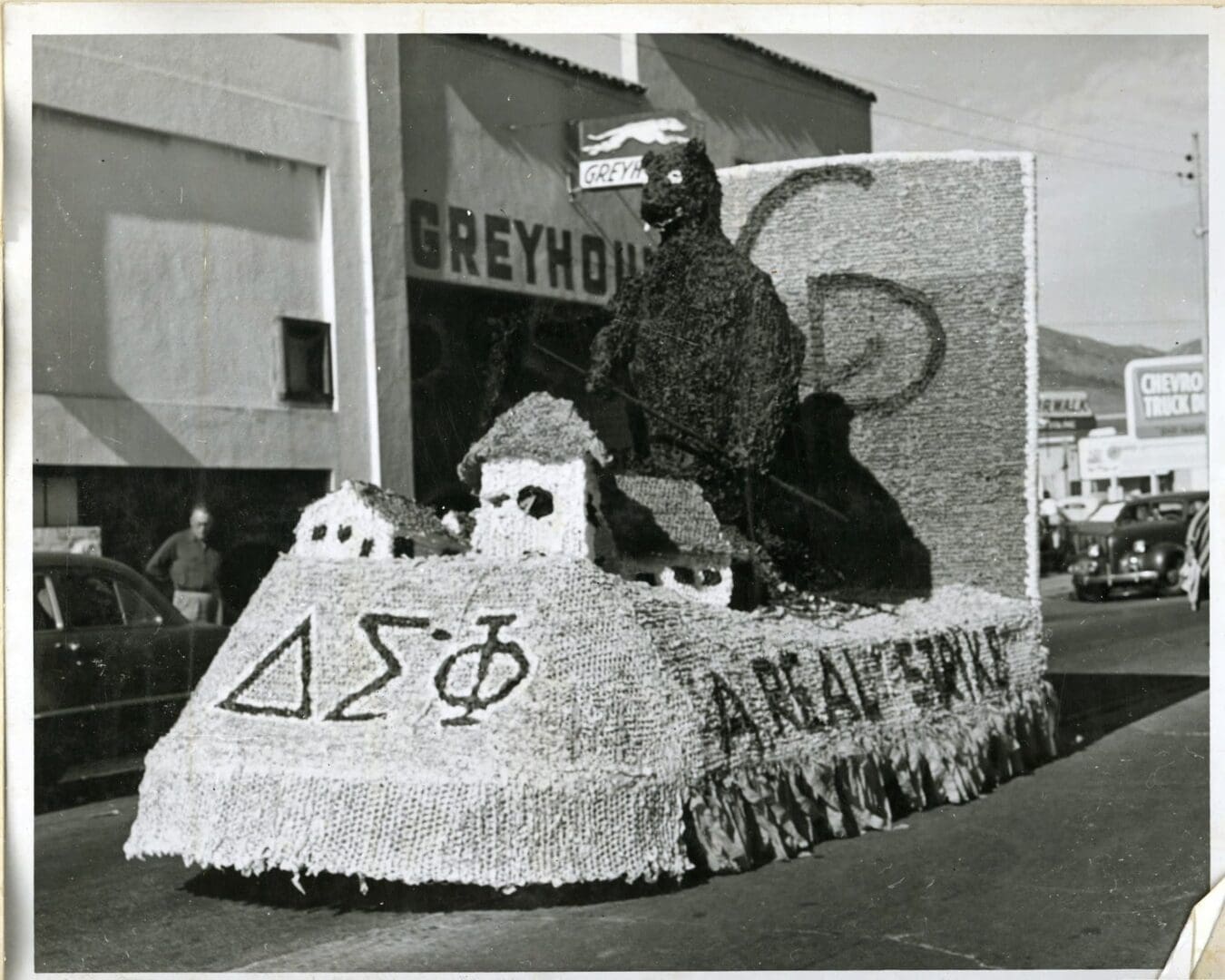 A float with a godzilla on it is shown.