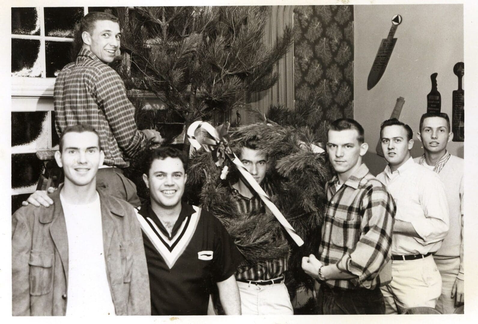 A group of men standing next to each other.