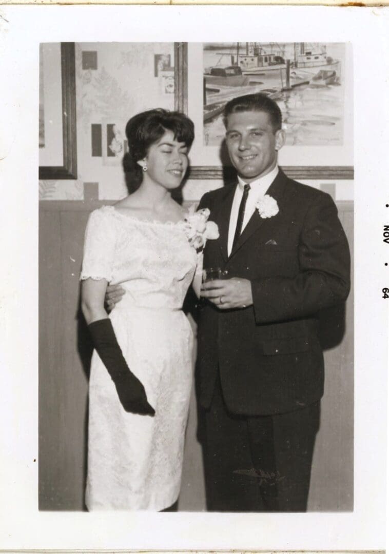 A man and woman posing for the camera.
