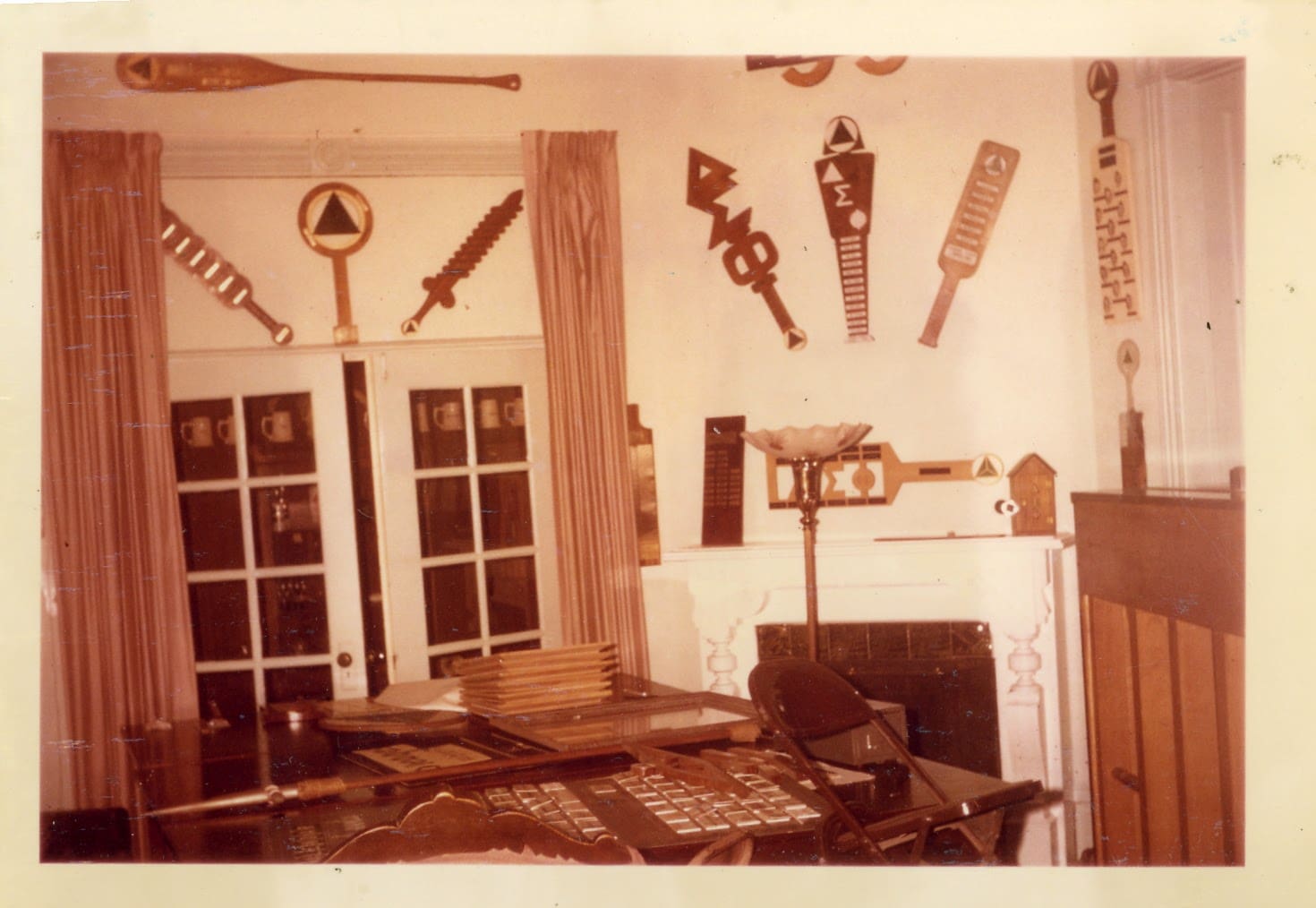 A room with many different types of tools on the wall.