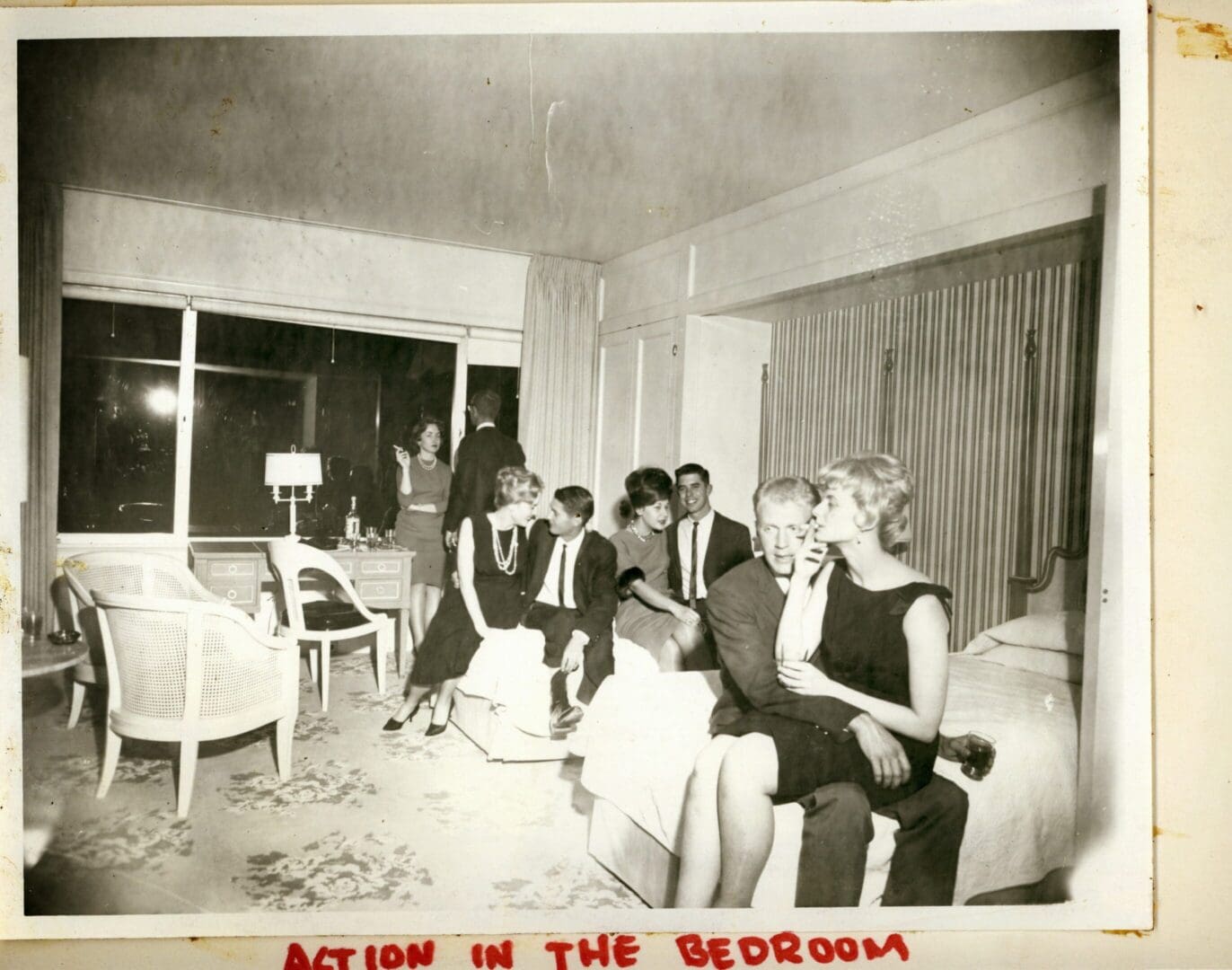 A group of people sitting on top of a couch.