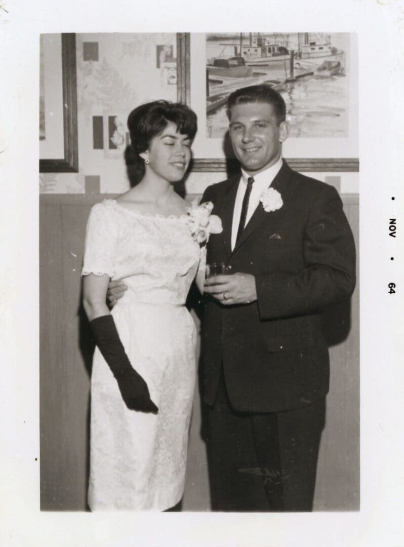 A man and woman posing for a picture.