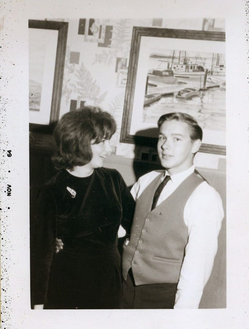 A man and woman standing next to each other.
