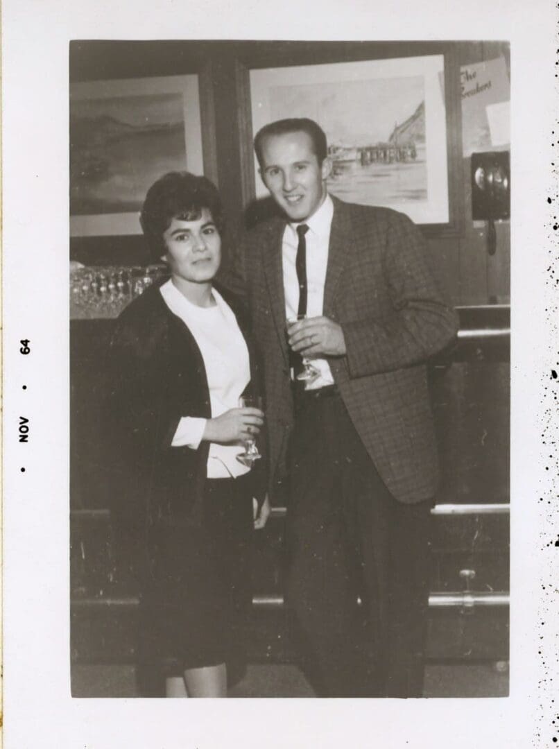 A man and woman standing next to each other.
