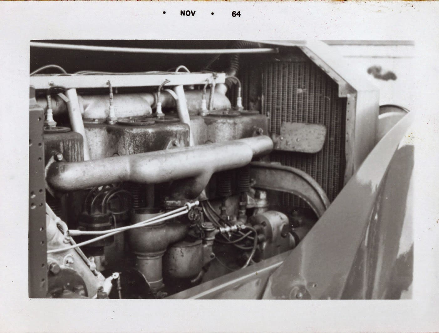 A black and white photo of an engine compartment.