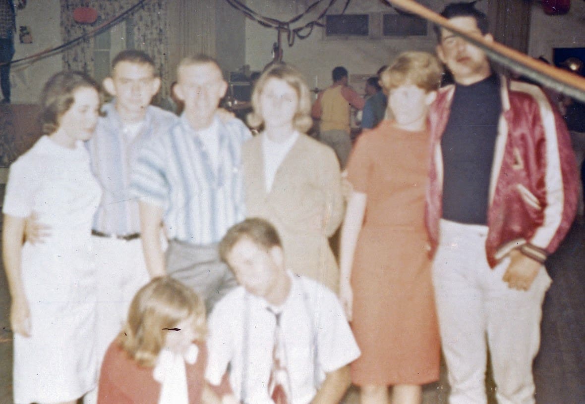 A group of people posing for the camera.
