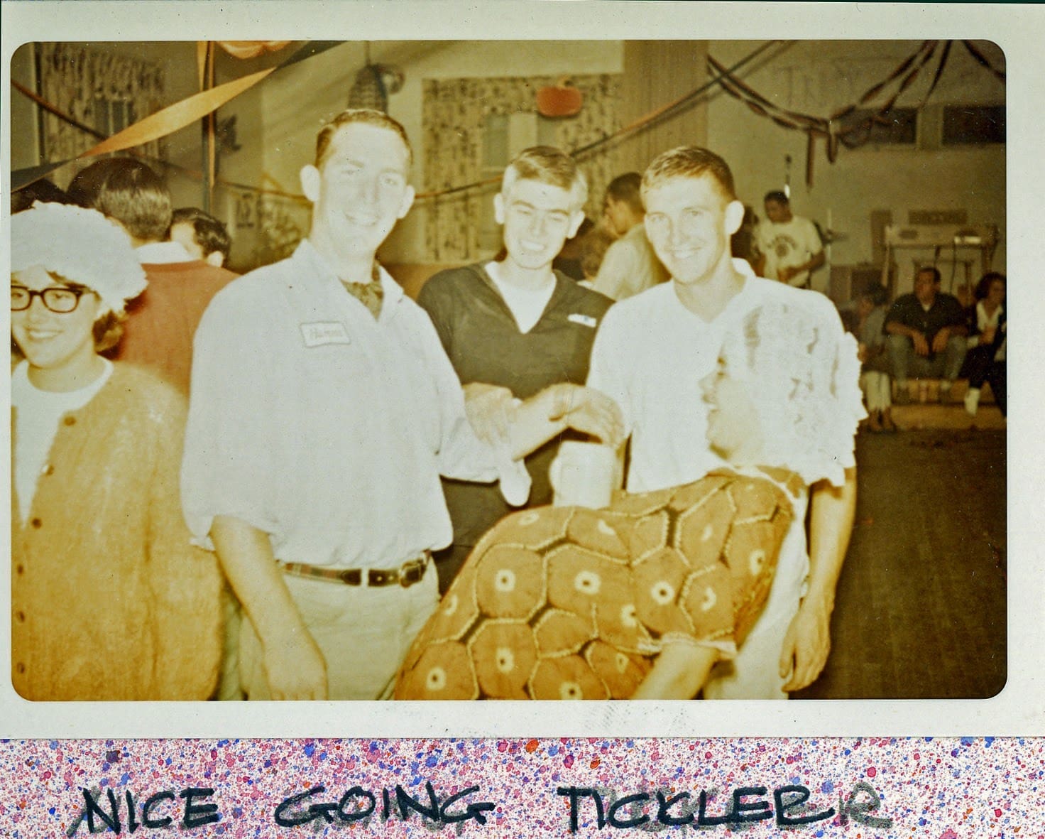 A group of men standing next to each other.