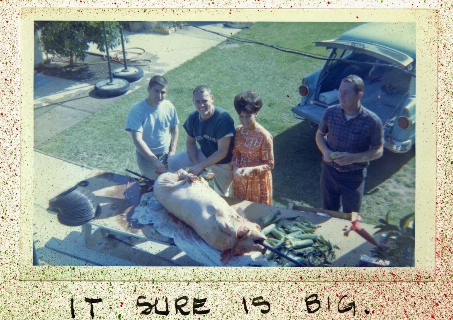 A group of people standing around a naked man.