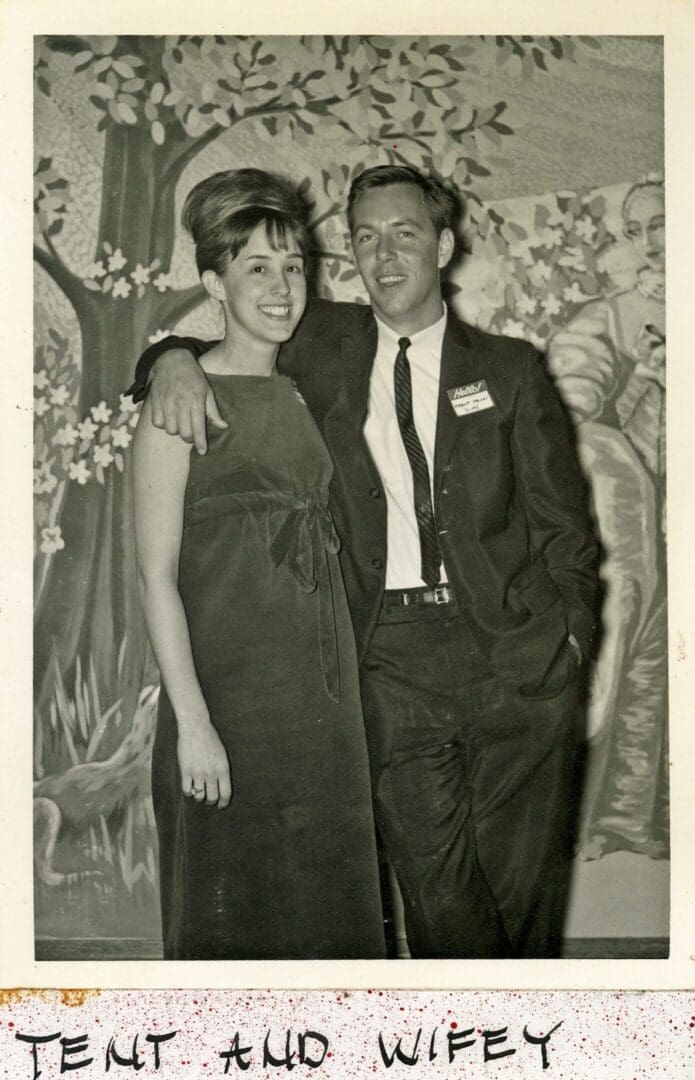 A man and woman posing for a picture.