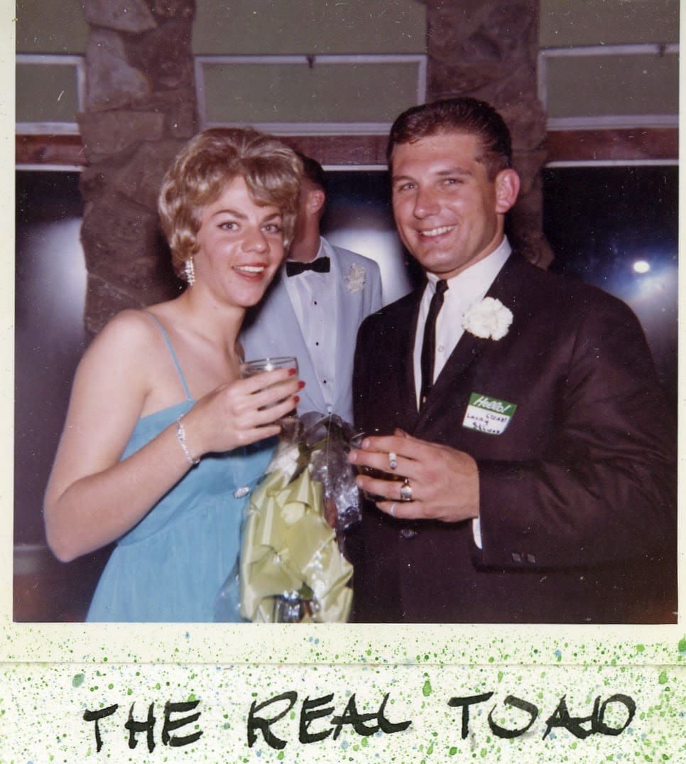 A man and woman posing for a picture.