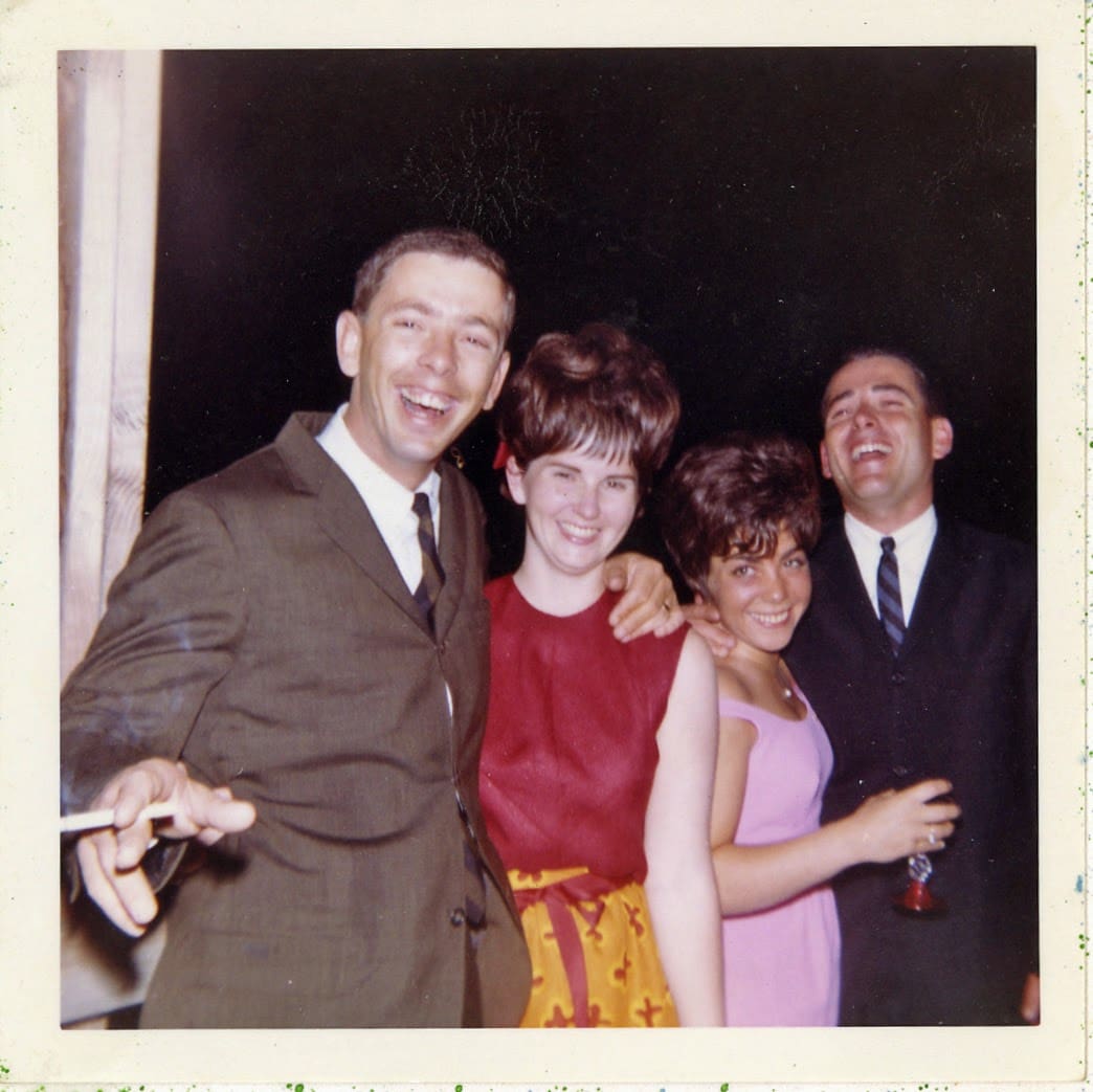 A group of people standing next to each other.