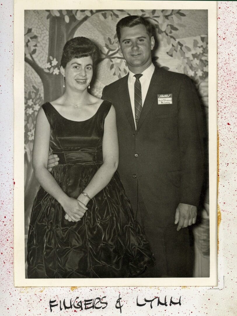 A man and woman posing for a picture.