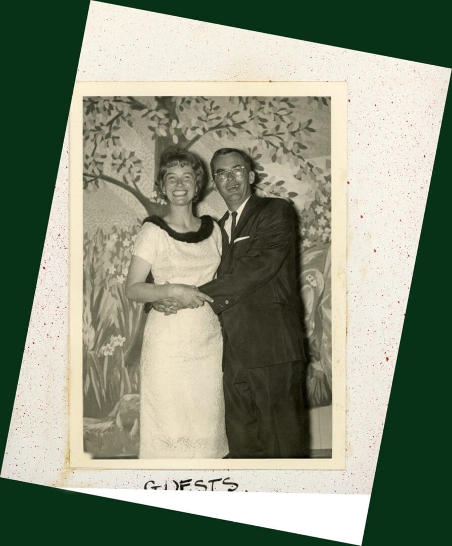 A man and woman standing next to each other.