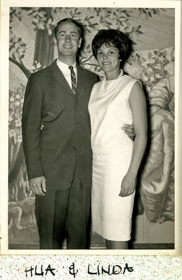 A man and woman standing next to each other.