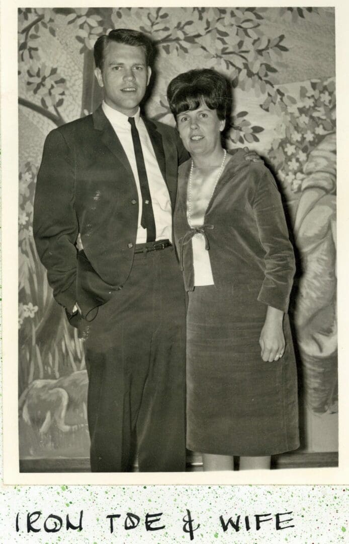 A man and woman standing next to each other.