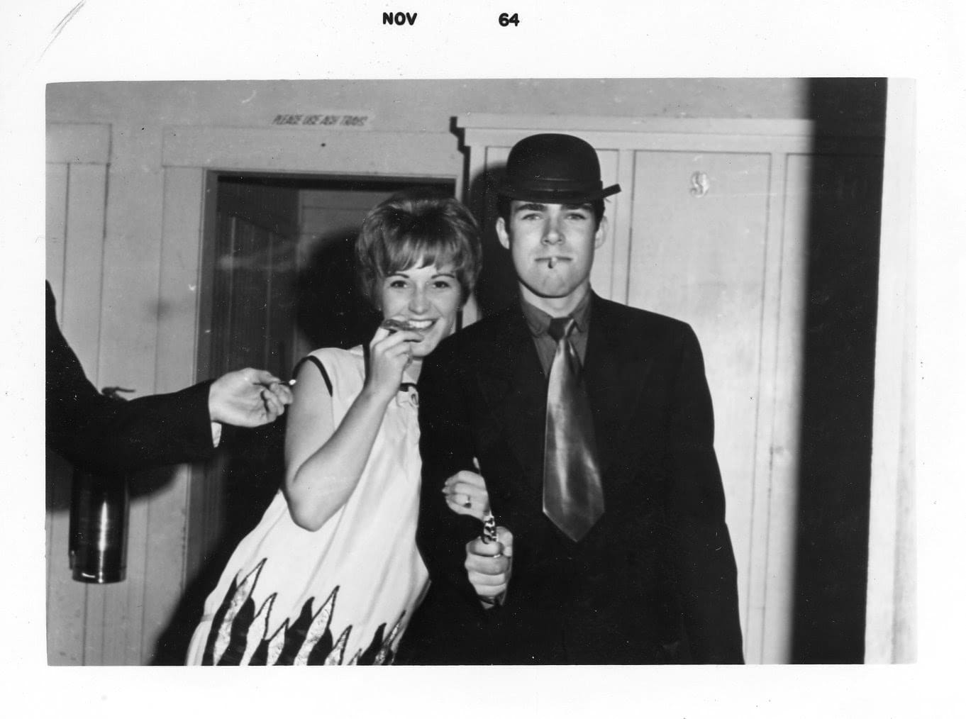 A man and woman posing for the camera.