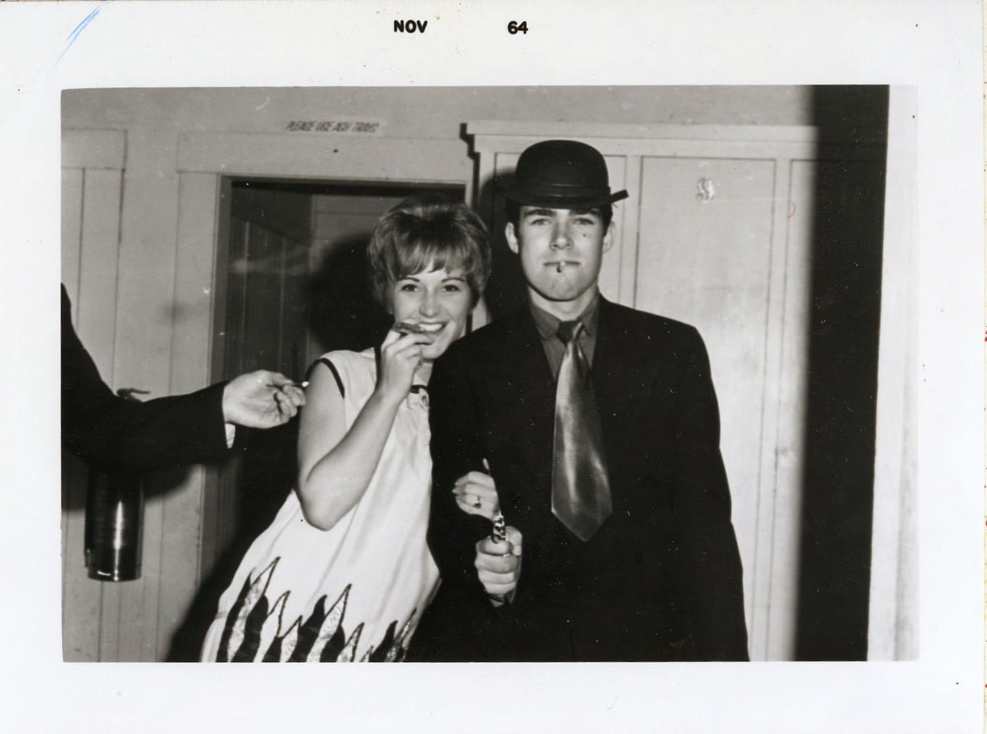 A man and woman posing for the camera.