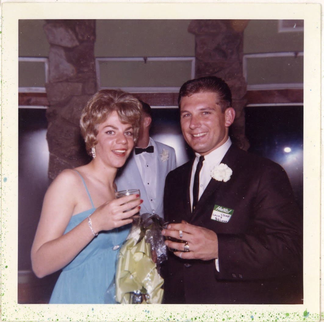 A man and woman posing for the camera.