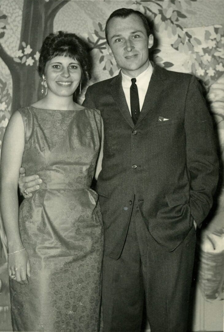 A man and woman posing for the camera.