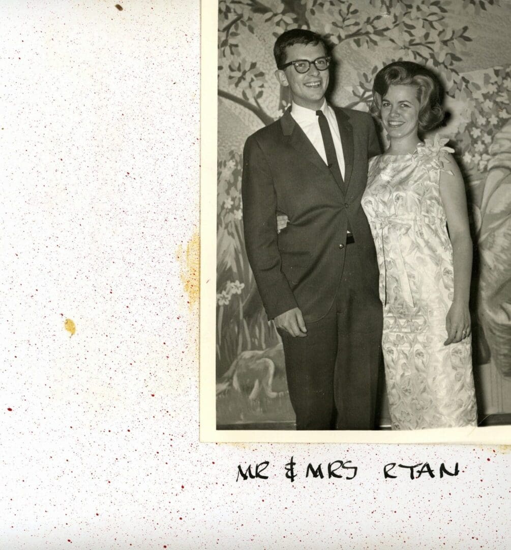 A man and woman posing for a picture.