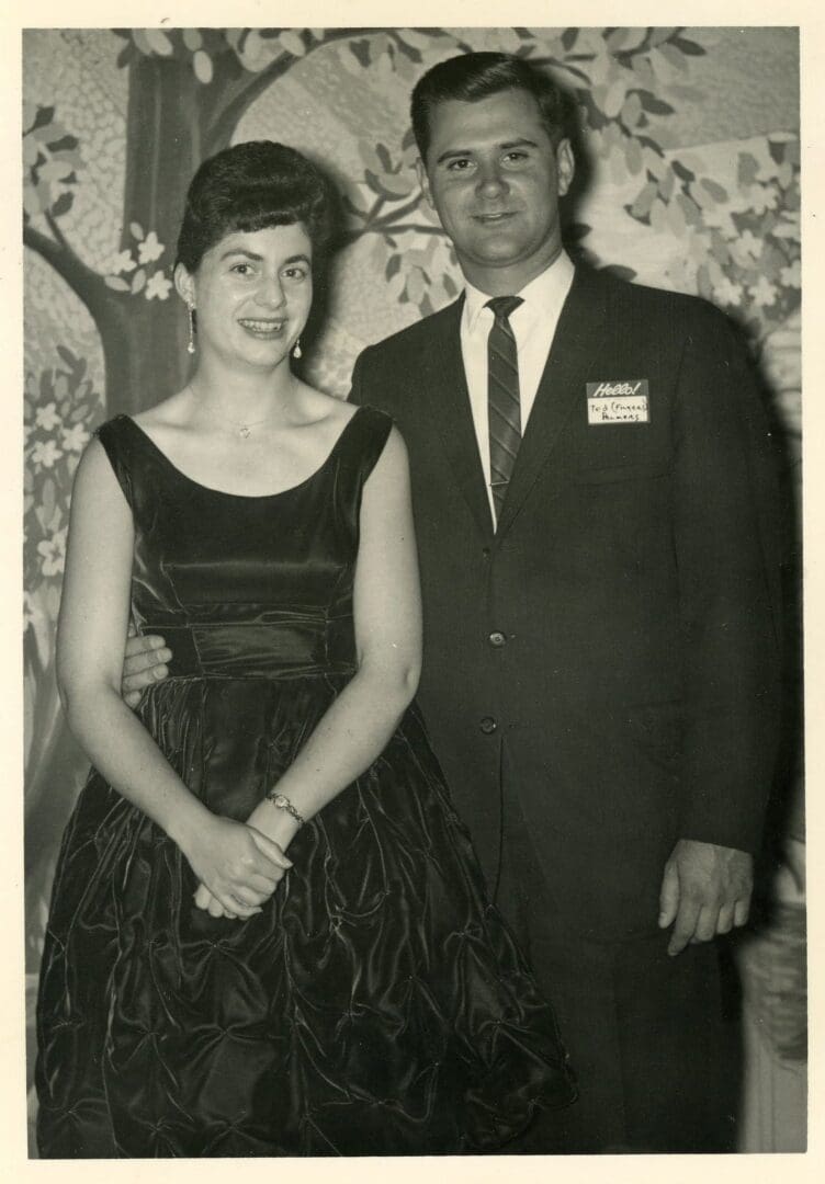 A man and woman posing for a picture.