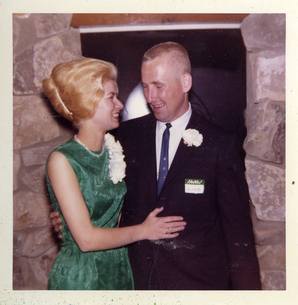 A man and woman standing next to each other.