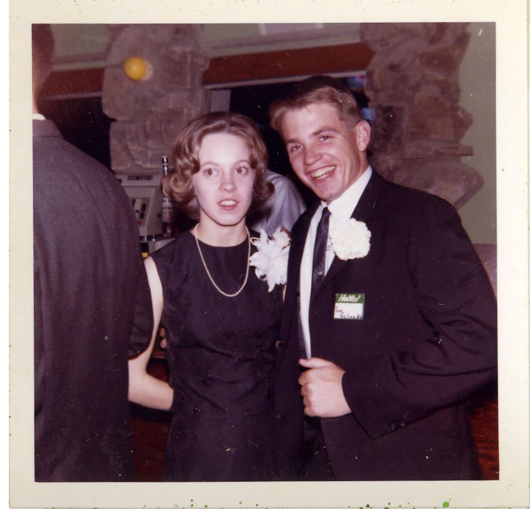 A man and woman posing for the camera.
